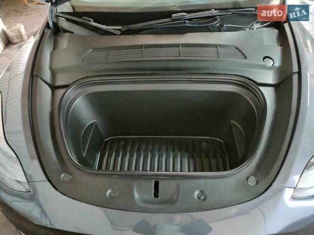 Серый Тесла Model Y, объемом двигателя 0 л и пробегом 30 тыс. км за 32350 $, фото 70 на Automoto.ua