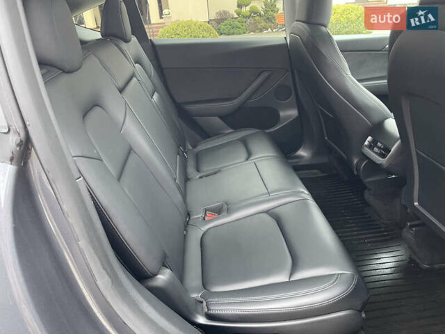 Серый Тесла Model Y, объемом двигателя 0 л и пробегом 35 тыс. км за 29200 $, фото 23 на Automoto.ua