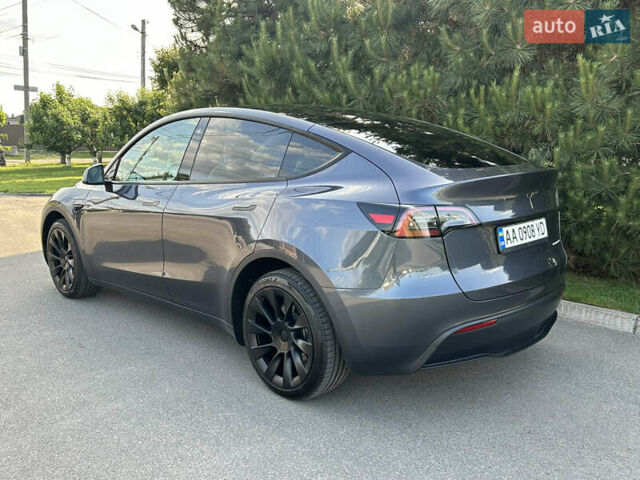 Серый Тесла Model Y, объемом двигателя 0 л и пробегом 55 тыс. км за 29500 $, фото 2 на Automoto.ua