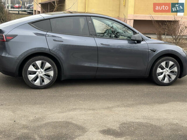 Серый Тесла Model Y, объемом двигателя 0 л и пробегом 20 тыс. км за 27000 $, фото 2 на Automoto.ua