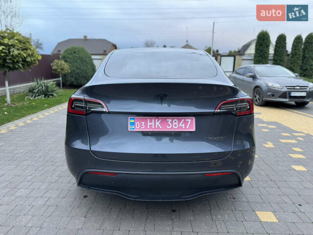Серый Тесла Model Y, объемом двигателя 0 л и пробегом 74 тыс. км за 26500 $, фото 5 на Automoto.ua
