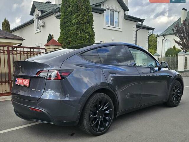 Серый Тесла Model Y, объемом двигателя 0 л и пробегом 38 тыс. км за 27900 $, фото 2 на Automoto.ua