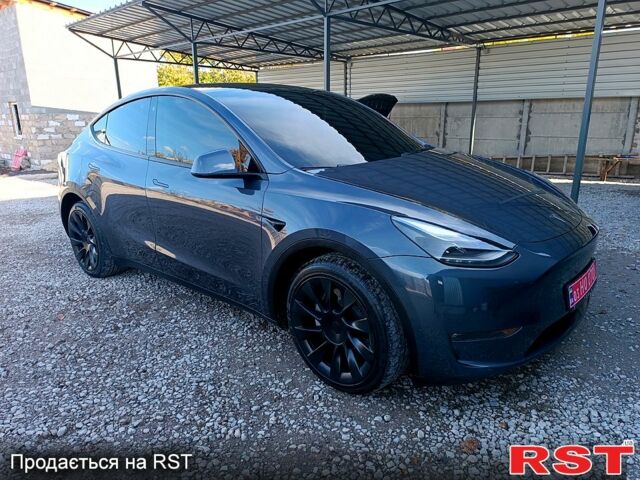 Серый Тесла Model Y, объемом двигателя 0.33 л и пробегом 43 тыс. км за 33333 $, фото 2 на Automoto.ua