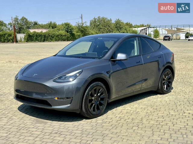 Серый Тесла Model Y, объемом двигателя 0 л и пробегом 45 тыс. км за 23700 $, фото 1 на Automoto.ua