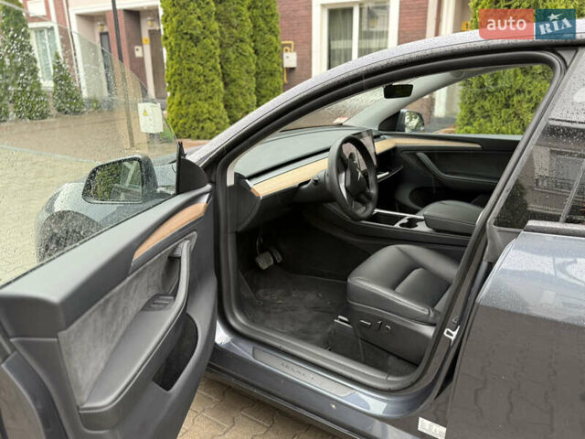 Серый Тесла Model Y, объемом двигателя 0 л и пробегом 18 тыс. км за 28500 $, фото 1 на Automoto.ua