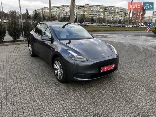 Серый Тесла Model Y, объемом двигателя 0 л и пробегом 24 тыс. км за 28399 $, фото 2 на Automoto.ua