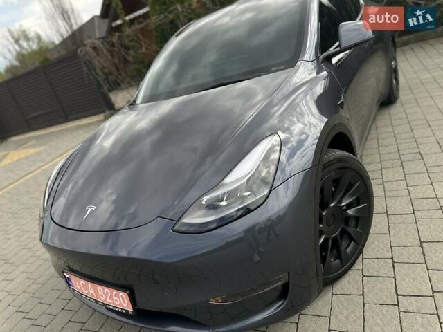 Серый Тесла Model Y, объемом двигателя 0 л и пробегом 9 тыс. км за 28950 $, фото 3 на Automoto.ua