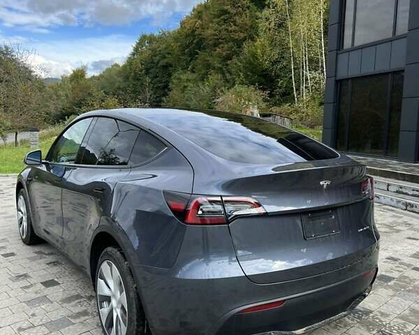 Тесла Model Y 2023 в Тячеве на Automoto.ua Серый Тесла Model Y, объемом двигателя 0 л и пробегом 32 тыс. км за 26700 $, фото 2 на Automoto.ua