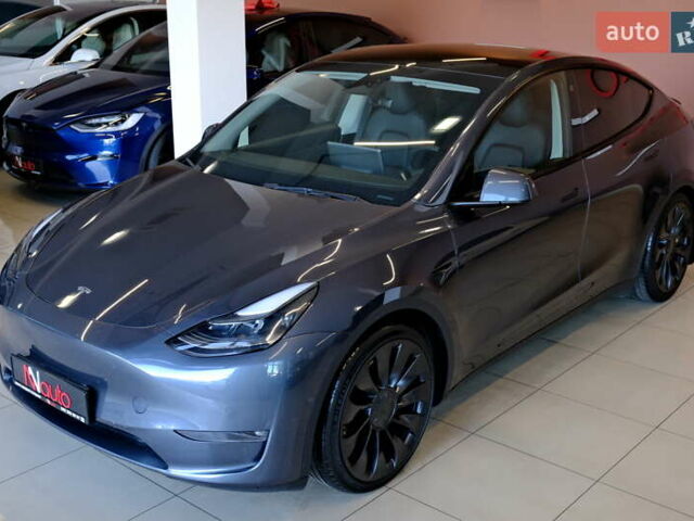 Серый Тесла Model Y, объемом двигателя 0 л и пробегом 42 тыс. км за 23900 $, фото 3 на Automoto.ua