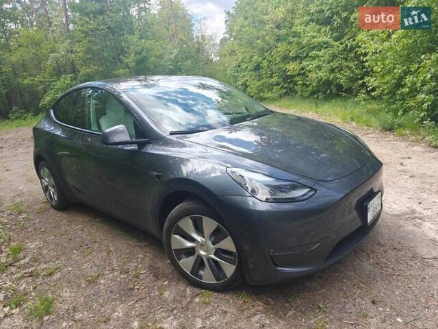 Серый Тесла Model Y, объемом двигателя 0 л и пробегом 17 тыс. км за 28777 $, фото 1 на Automoto.ua