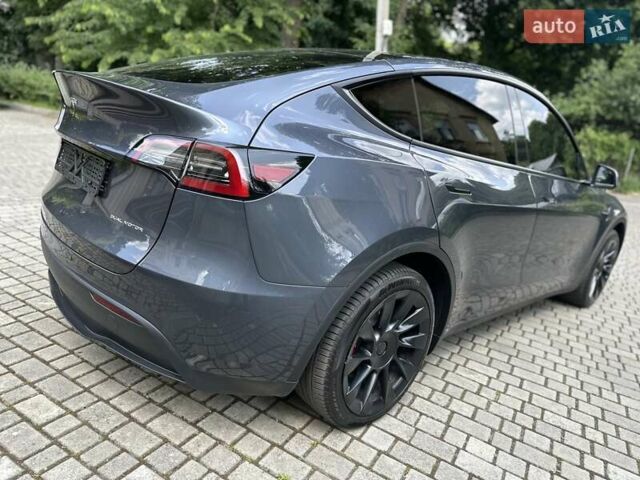 Серый Тесла Model Y, объемом двигателя 0 л и пробегом 55 тыс. км за 25100 $, фото 26 на Automoto.ua