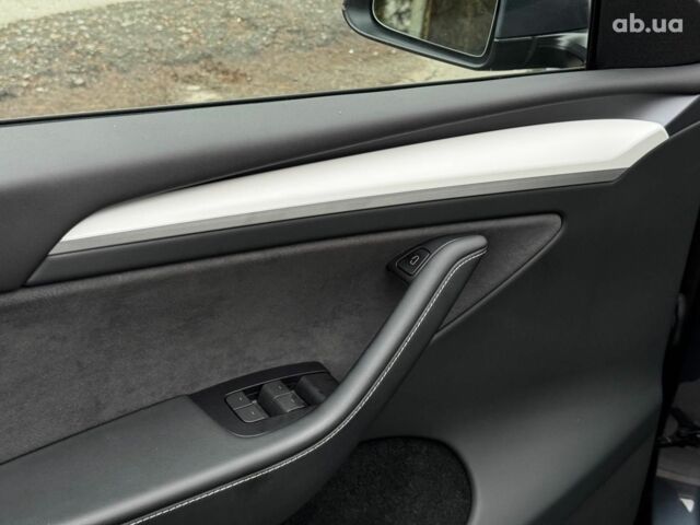 Серый Тесла Model Y, объемом двигателя 0 л и пробегом 22 тыс. км за 25990 $, фото 10 на Automoto.ua