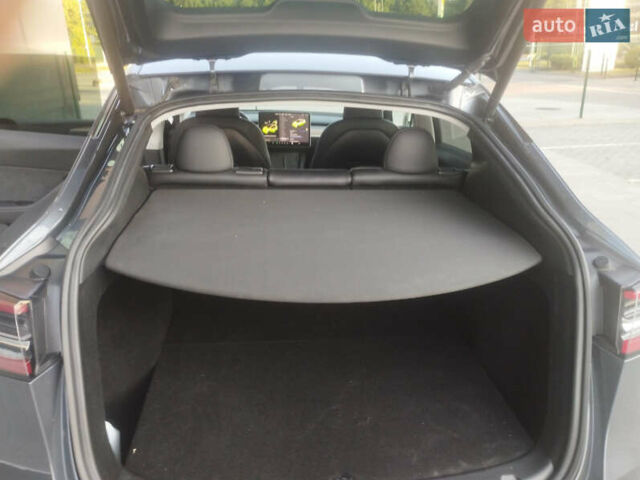 Серый Тесла Model Y, объемом двигателя 0 л и пробегом 10 тыс. км за 32700 $, фото 8 на Automoto.ua