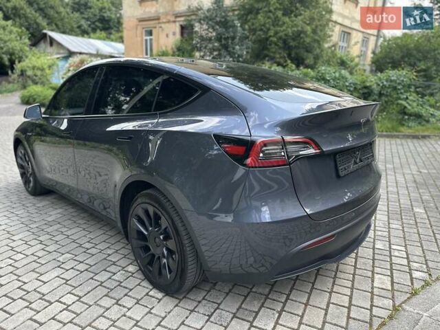 Серый Тесла Model Y, объемом двигателя 0 л и пробегом 55 тыс. км за 25100 $, фото 33 на Automoto.ua