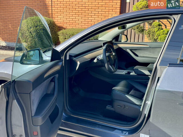 Серый Тесла Model Y, объемом двигателя 0 л и пробегом 21 тыс. км за 25300 $, фото 17 на Automoto.ua