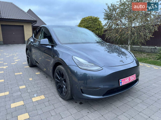 Серый Тесла Model Y, объемом двигателя 0 л и пробегом 74 тыс. км за 26500 $, фото 1 на Automoto.ua