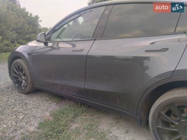 Серый Тесла Model Y, объемом двигателя 0 л и пробегом 25 тыс. км за 28000 $, фото 3 на Automoto.ua