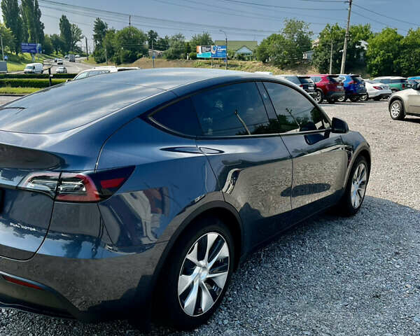 Серый Тесла Model Y, объемом двигателя 0 л и пробегом 11 тыс. км за 36999 $, фото 3 на Automoto.ua