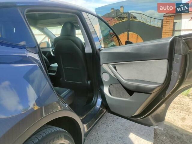 Серый Тесла Model Y, объемом двигателя 0 л и пробегом 30 тыс. км за 32350 $, фото 55 на Automoto.ua