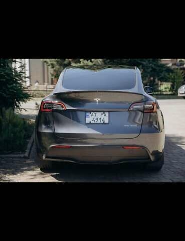 Серый Тесла Model Y, объемом двигателя 0 л и пробегом 24 тыс. км за 29300 $, фото 1 на Automoto.ua