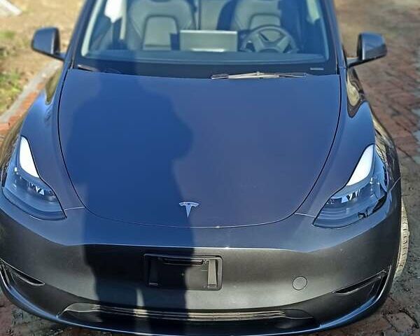 Серый Тесла Model Y, объемом двигателя 0 л и пробегом 46 тыс. км за 31000 $, фото 2 на Automoto.ua