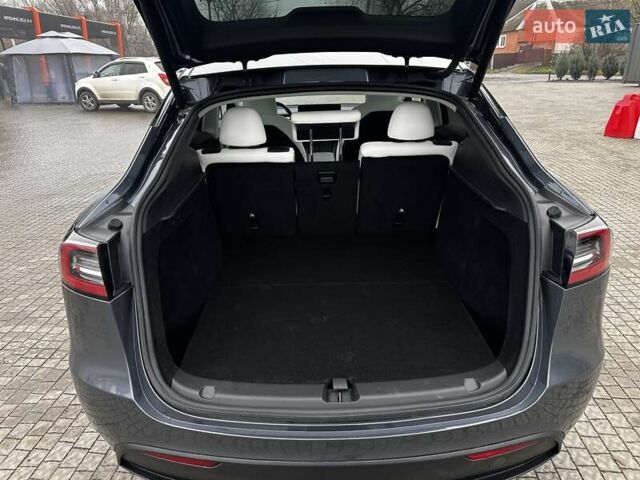 Серый Тесла Model Y, объемом двигателя 0 л и пробегом 24 тыс. км за 28399 $, фото 24 на Automoto.ua