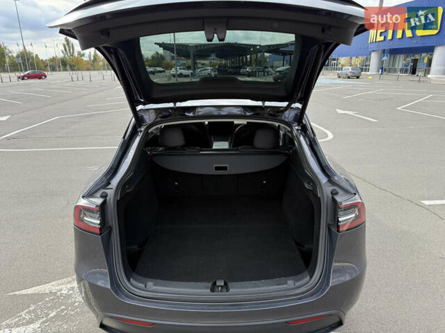Серый Тесла Model Y, объемом двигателя 0 л и пробегом 71 тыс. км за 28900 $, фото 14 на Automoto.ua