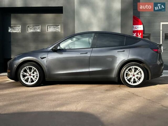 Сірий Тесла Model Y, об'ємом двигуна 0 л та пробігом 27 тис. км за 28999 $, фото 4 на Automoto.ua