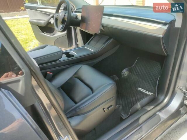 Серый Тесла Model Y, объемом двигателя 0 л и пробегом 30 тыс. км за 32350 $, фото 45 на Automoto.ua