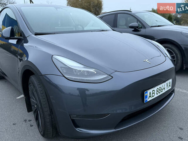Серый Тесла Model Y, объемом двигателя 0 л и пробегом 32 тыс. км за 24900 $, фото 1 на Automoto.ua