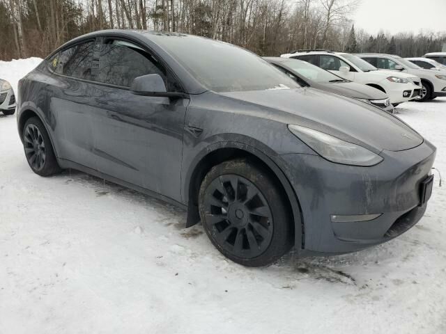Серый Тесла Model Y, объемом двигателя 0 л и пробегом 0 тыс. км за 23500 $, фото 2 на Automoto.ua