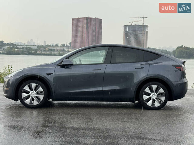 Серый Тесла Model Y, объемом двигателя 0 л и пробегом 66 тыс. км за 27900 $, фото 6 на Automoto.ua