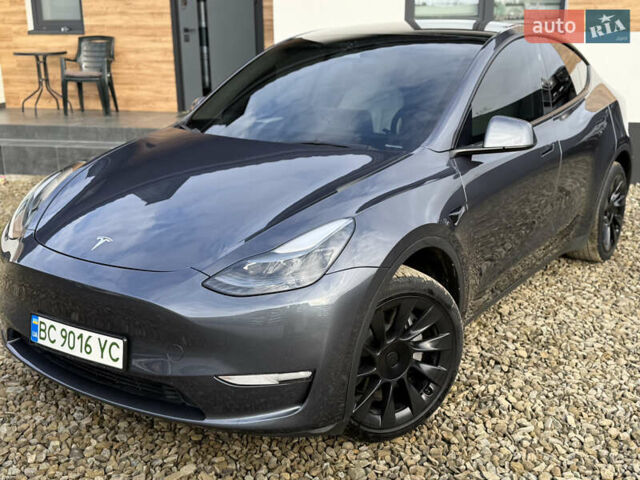 Сірий Тесла Model Y, об'ємом двигуна 0 л та пробігом 28 тис. км за 27900 $, фото 1 на Automoto.ua