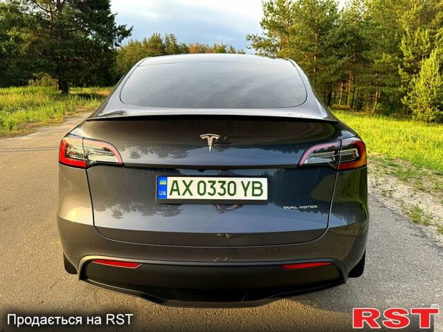 Серый Тесла Model Y, объемом двигателя 0 л и пробегом 8 тыс. км за 34500 $, фото 2 на Automoto.ua