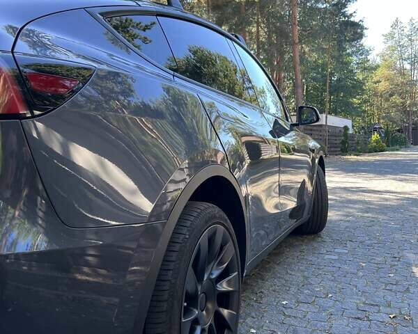 Серый Тесла Model Y, объемом двигателя 0 л и пробегом 17 тыс. км за 33900 $, фото 11 на Automoto.ua