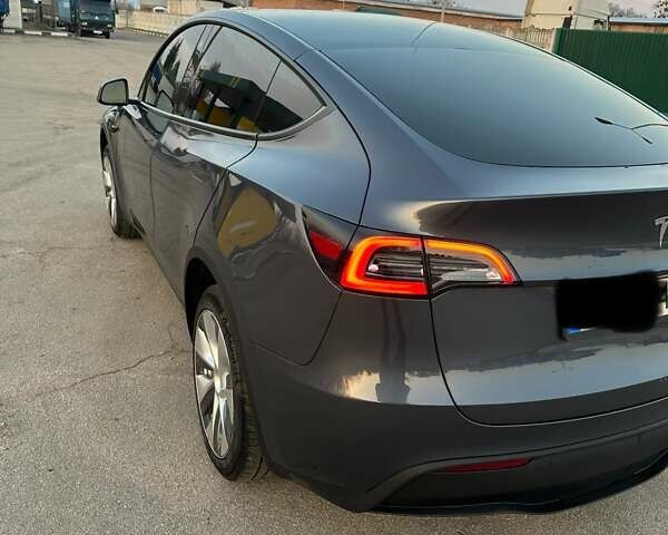 Серый Тесла Model Y, объемом двигателя 0 л и пробегом 65 тыс. км за 26300 $, фото 6 на Automoto.ua