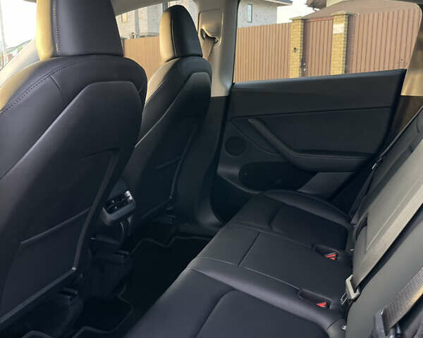 Серый Тесла Model Y, объемом двигателя 0 л и пробегом 13 тыс. км за 32300 $, фото 7 на Automoto.ua