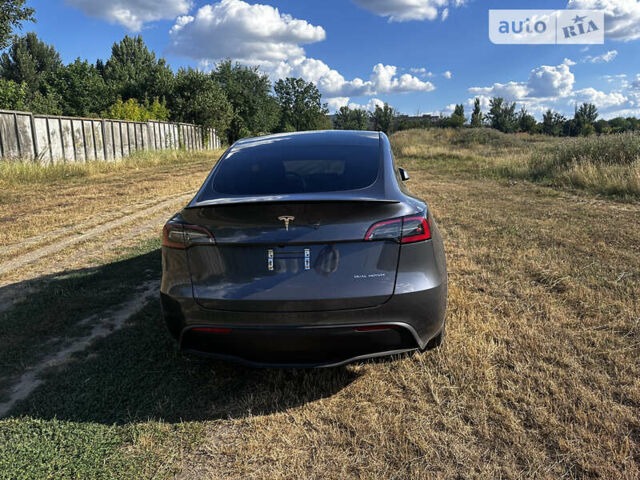Серый Тесла Model Y, объемом двигателя 0 л и пробегом 31 тыс. км за 26500 $, фото 4 на Automoto.ua