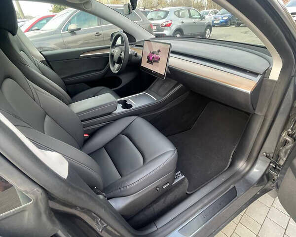 Серый Тесла Model Y, объемом двигателя 0 л и пробегом 41 тыс. км за 27300 $, фото 42 на Automoto.ua