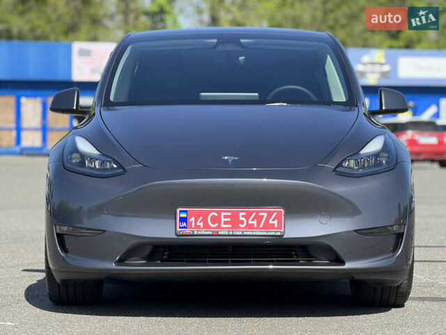Серый Тесла Model Y, объемом двигателя 0 л и пробегом 28 тыс. км за 29000 $, фото 2 на Automoto.ua