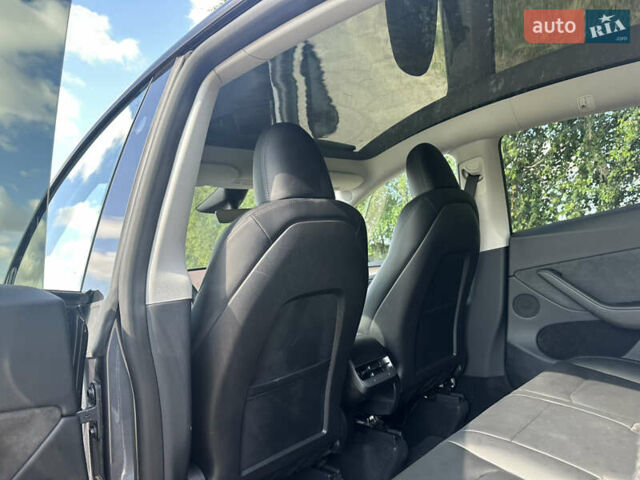 Сірий Тесла Model Y, об'ємом двигуна 0 л та пробігом 32 тис. км за 24700 $, фото 17 на Automoto.ua