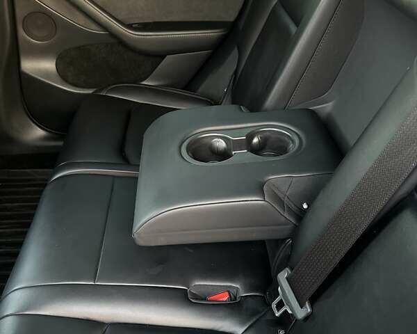 Серый Тесла Model Y, объемом двигателя 0 л и пробегом 65 тыс. км за 26300 $, фото 30 на Automoto.ua