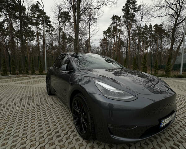 Серый Тесла Model Y, объемом двигателя 0 л и пробегом 22 тыс. км за 32000 $, фото 2 на Automoto.ua