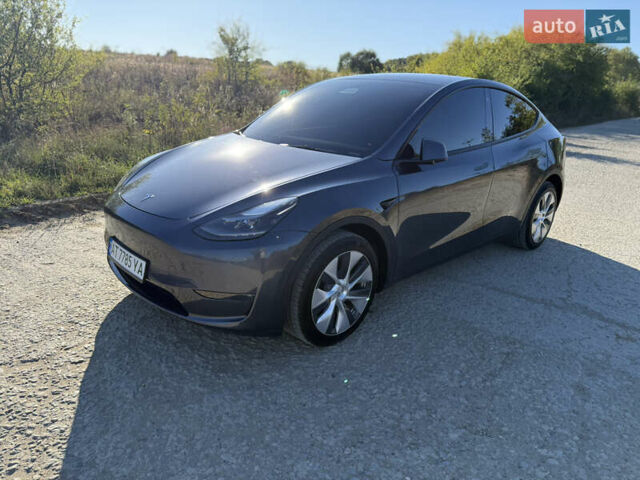 Серый Тесла Model Y, объемом двигателя 0 л и пробегом 41 тыс. км за 29800 $, фото 2 на Automoto.ua