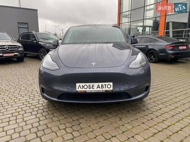 Серый Тесла Model Y, объемом двигателя 0 л и пробегом 30 тыс. км за 31700 $, фото 1 на Automoto.ua