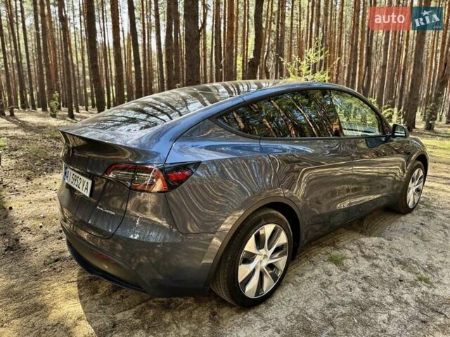 Серый Тесла Model Y, объемом двигателя 0 л и пробегом 15 тыс. км за 27100 $, фото 16 на Automoto.ua