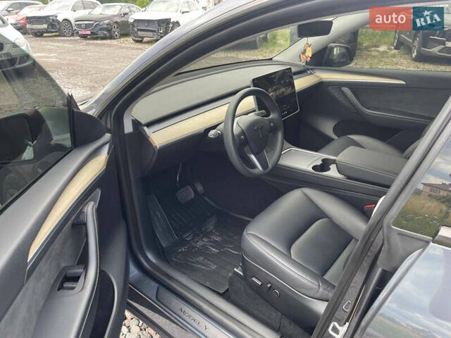 Серый Тесла Model Y, объемом двигателя 0 л и пробегом 41 тыс. км за 27500 $, фото 13 на Automoto.ua
