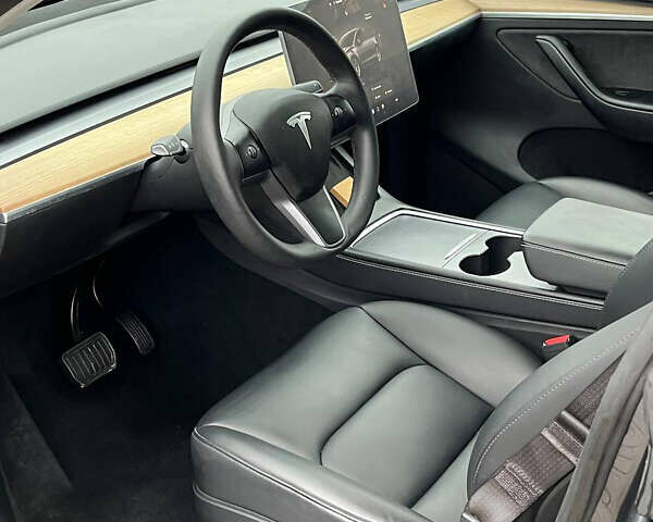 Серый Тесла Model Y, объемом двигателя 0 л и пробегом 20 тыс. км за 25500 $, фото 18 на Automoto.ua