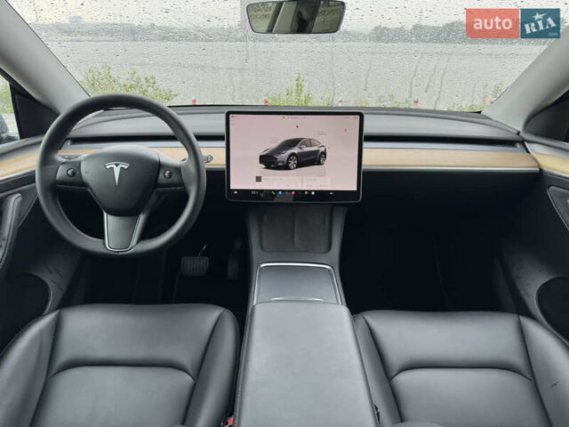 Серый Тесла Model Y, объемом двигателя 0 л и пробегом 66 тыс. км за 27900 $, фото 18 на Automoto.ua