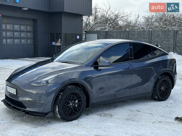 Серый Тесла Model Y, объемом двигателя 0 л и пробегом 26 тыс. км за 33500 $, фото 4 на Automoto.ua